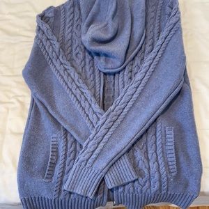 Rarely worn perfect condition zip up sweater.